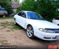 Белый Мазда 626, объемом двигателя 2 л и пробегом 315 тыс. км за 900 $, фото 1 на Automoto.ua