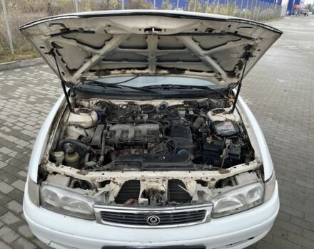 Белый Мазда 626, объемом двигателя 2 л и пробегом 300 тыс. км за 1099 $, фото 5 на Automoto.ua