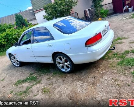 Белый Мазда 626, объемом двигателя 2 л и пробегом 315 тыс. км за 900 $, фото 2 на Automoto.ua