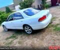 Белый Мазда 626, объемом двигателя 2 л и пробегом 315 тыс. км за 900 $, фото 2 на Automoto.ua