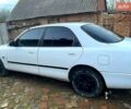 Белый Мазда 626, объемом двигателя 1.8 л и пробегом 300 тыс. км за 950 $, фото 1 на Automoto.ua