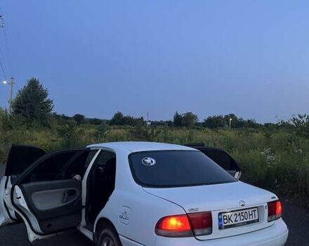 Белый Мазда 626, объемом двигателя 1.84 л и пробегом 400 тыс. км за 1446 $, фото 24 на Automoto.ua