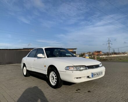 Белый Мазда 626, объемом двигателя 2 л и пробегом 150 тыс. км за 1200 $, фото 1 на Automoto.ua