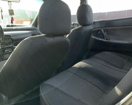 Белый Мазда 626, объемом двигателя 2 л и пробегом 150 тыс. км за 1200 $, фото 5 на Automoto.ua