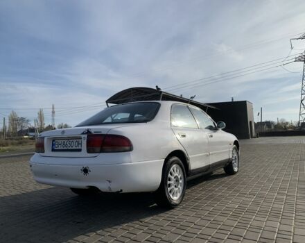 Белый Мазда 626, объемом двигателя 2 л и пробегом 150 тыс. км за 1200 $, фото 3 на Automoto.ua