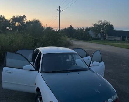 Белый Мазда 626, объемом двигателя 1.84 л и пробегом 400 тыс. км за 1446 $, фото 4 на Automoto.ua