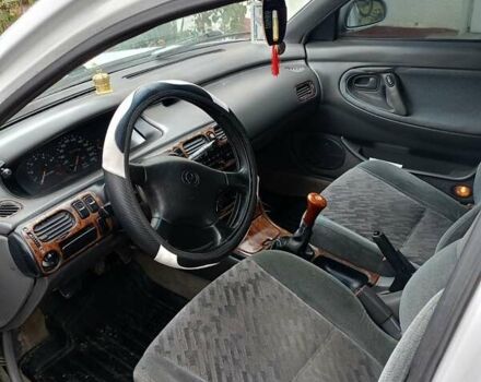 Белый Мазда 626, объемом двигателя 2.5 л и пробегом 330 тыс. км за 2300 $, фото 1 на Automoto.ua