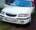 Белый Мазда 626, объемом двигателя 2 л и пробегом 287 тыс. км за 1900 $, фото 1 на Automoto.ua