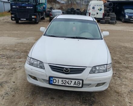 Белый Мазда 626, объемом двигателя 2 л и пробегом 300 тыс. км за 1800 $, фото 1 на Automoto.ua