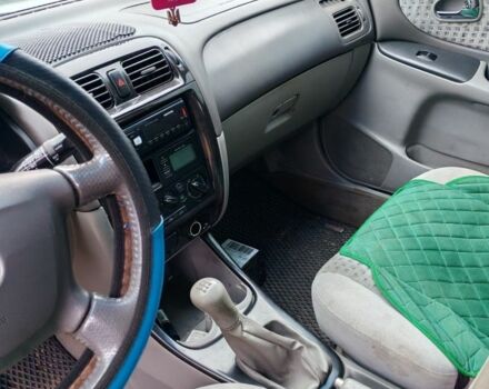 Белый Мазда 626, объемом двигателя 2 л и пробегом 300 тыс. км за 1800 $, фото 6 на Automoto.ua