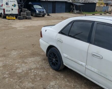 Белый Мазда 626, объемом двигателя 2 л и пробегом 300 тыс. км за 1800 $, фото 2 на Automoto.ua