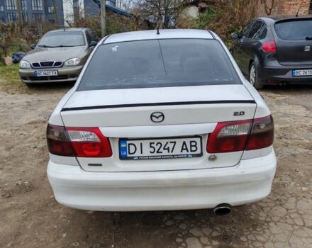 Белый Мазда 626, объемом двигателя 2 л и пробегом 300 тыс. км за 1800 $, фото 3 на Automoto.ua