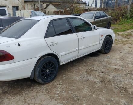 Белый Мазда 626, объемом двигателя 2 л и пробегом 300 тыс. км за 1800 $, фото 4 на Automoto.ua