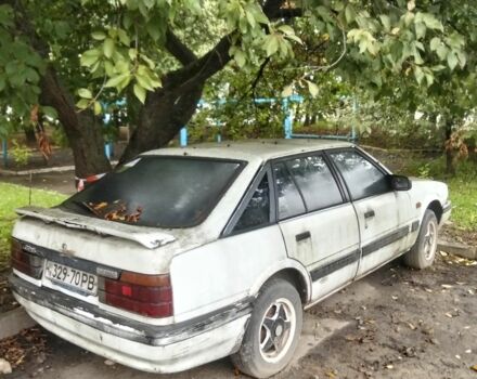 Белый Мазда 626, объемом двигателя 0 л и пробегом 400 тыс. км за 250 $, фото 5 на Automoto.ua