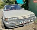 Белый Мазда 626, объемом двигателя 2 л и пробегом 194 тыс. км за 1300 $, фото 2 на Automoto.ua