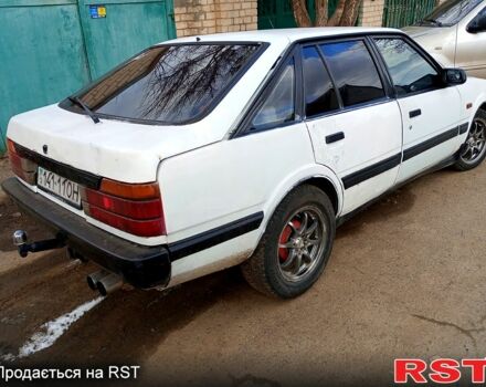 Білий Мазда 626, об'ємом двигуна 20 л та пробігом 407 тис. км за 1450 $, фото 3 на Automoto.ua