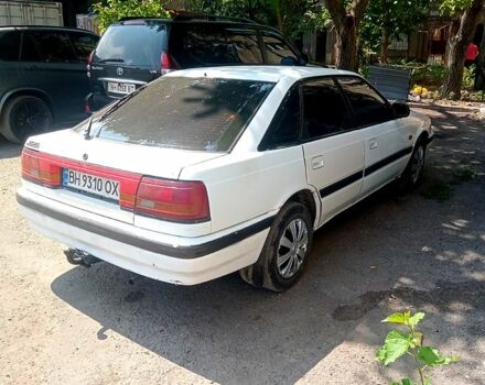 Білий Мазда 626, об'ємом двигуна 2 л та пробігом 111 тис. км за 1350 $, фото 1 на Automoto.ua