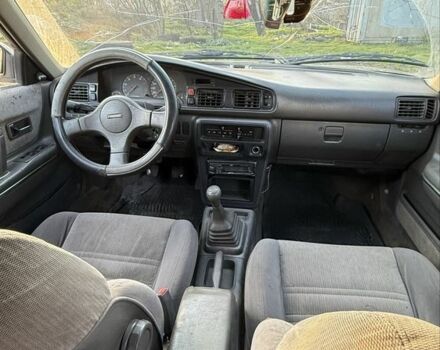 Білий Мазда 626, об'ємом двигуна 2 л та пробігом 225 тис. км за 1100 $, фото 3 на Automoto.ua