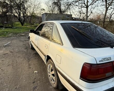 Білий Мазда 626, об'ємом двигуна 2 л та пробігом 225 тис. км за 1100 $, фото 2 на Automoto.ua