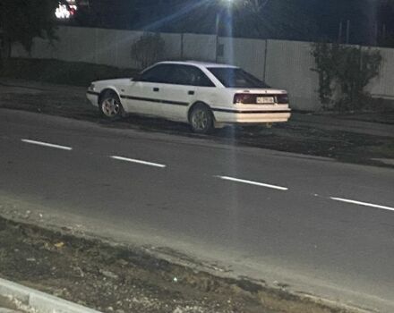 Белый Мазда 626, объемом двигателя 2 л и пробегом 255 тыс. км за 1100 $, фото 4 на Automoto.ua