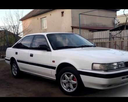 Белый Мазда 626, объемом двигателя 2 л и пробегом 255 тыс. км за 1100 $, фото 2 на Automoto.ua