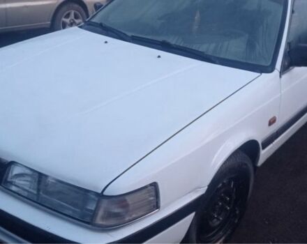 Белый Мазда 626, объемом двигателя 2 л и пробегом 255 тыс. км за 1100 $, фото 3 на Automoto.ua