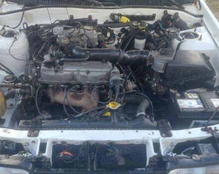 Белый Мазда 626, объемом двигателя 2 л и пробегом 255 тыс. км за 1100 $, фото 6 на Automoto.ua