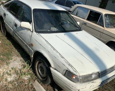 Белый Мазда 626, объемом двигателя 2 л и пробегом 300 тыс. км за 523 $, фото 2 на Automoto.ua