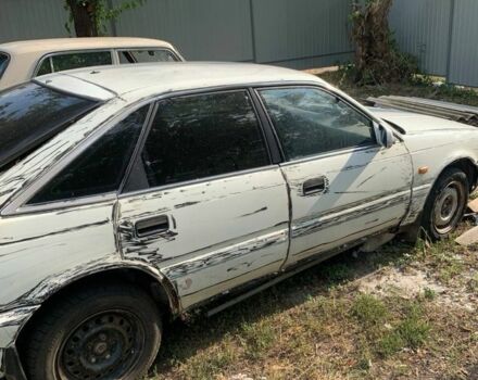 Белый Мазда 626, объемом двигателя 2 л и пробегом 300 тыс. км за 523 $, фото 4 на Automoto.ua