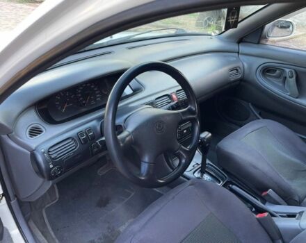 Белый Мазда 626, объемом двигателя 2 л и пробегом 146 тыс. км за 2250 $, фото 4 на Automoto.ua