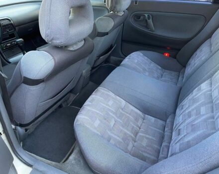 Белый Мазда 626, объемом двигателя 2 л и пробегом 146 тыс. км за 2250 $, фото 12 на Automoto.ua