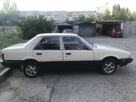 Белый Мазда 626, объемом двигателя 1.6 л и пробегом 130 тыс. км за 1300 $, фото 1 на Automoto.ua