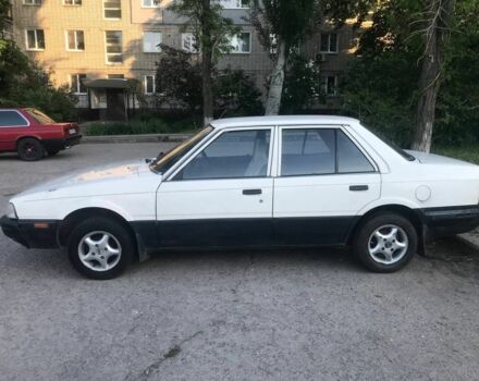 Белый Мазда 626, объемом двигателя 0 л и пробегом 100 тыс. км за 1400 $, фото 1 на Automoto.ua