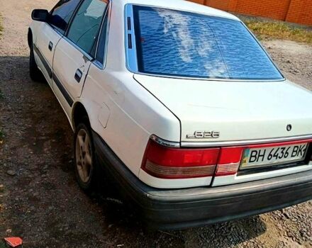 Білий Мазда 626, об'ємом двигуна 1.8 л та пробігом 0 тис. км за 650 $, фото 1 на Automoto.ua