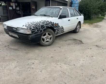 Белый Мазда 626, объемом двигателя 2 л и пробегом 300 тыс. км за 852 $, фото 1 на Automoto.ua