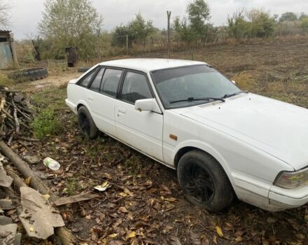 Белый Мазда 626, объемом двигателя 2 л и пробегом 464 тыс. км за 699 $, фото 1 на Automoto.ua