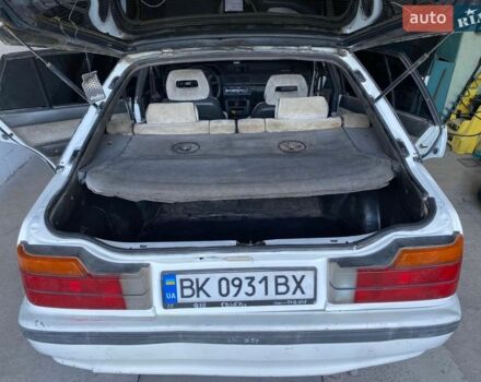 Белый Мазда 626, объемом двигателя 2 л и пробегом 400 тыс. км за 1000 $, фото 1 на Automoto.ua