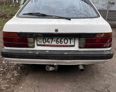 Белый Мазда 626, объемом двигателя 2.02 л и пробегом 200 тыс. км за 600 $, фото 1 на Automoto.ua