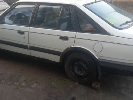 Белый Мазда 626, объемом двигателя 2 л и пробегом 3 тыс. км за 1063 $, фото 1 на Automoto.ua