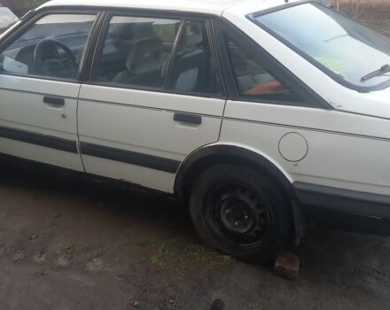 Белый Мазда 626, объемом двигателя 2 л и пробегом 3 тыс. км за 1063 $, фото 1 на Automoto.ua