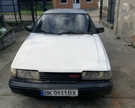 Белый Мазда 626, объемом двигателя 2 л и пробегом 519 тыс. км за 852 $, фото 1 на Automoto.ua