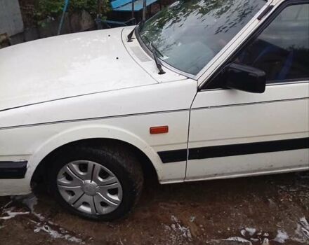 Белый Мазда 626, объемом двигателя 2 л и пробегом 344 тыс. км за 800 $, фото 1 на Automoto.ua