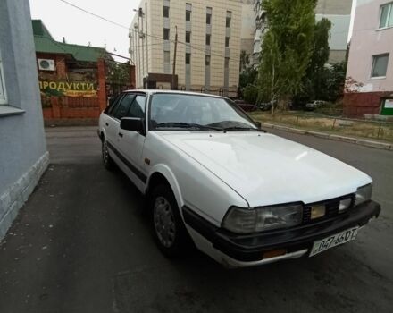 Белый Мазда 626, объемом двигателя 1.7 л и пробегом 260 тыс. км за 750 $, фото 1 на Automoto.ua