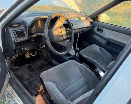 Белый Мазда 626, объемом двигателя 2 л и пробегом 350 тыс. км за 291 $, фото 1 на Automoto.ua