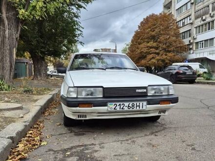 Белый Мазда 626, объемом двигателя 1.6 л и пробегом 234 тыс. км за 1600 $, фото 1 на Automoto.ua