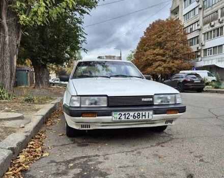 Белый Мазда 626, объемом двигателя 1.6 л и пробегом 234 тыс. км за 1600 $, фото 1 на Automoto.ua