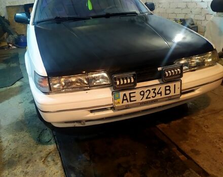 Белый Мазда 626, объемом двигателя 2 л и пробегом 350 тыс. км за 1200 $, фото 1 на Automoto.ua