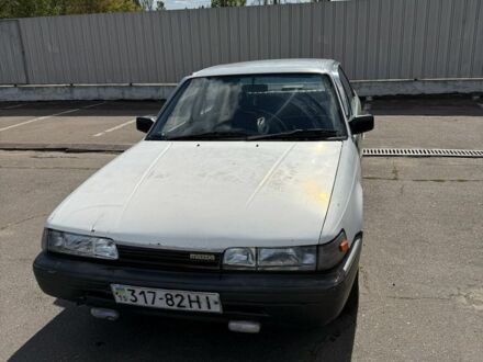 Белый Мазда 626, объемом двигателя 2 л и пробегом 284 тыс. км за 800 $, фото 1 на Automoto.ua