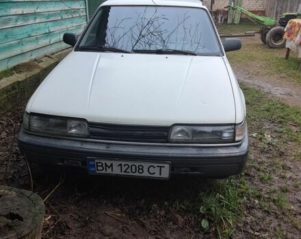 Белый Мазда 626, объемом двигателя 2 л и пробегом 1 тыс. км за 831 $, фото 1 на Automoto.ua