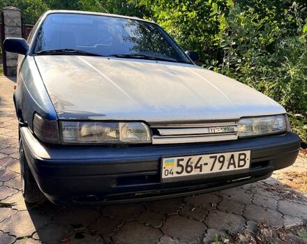 Белый Мазда 626, объемом двигателя 2 л и пробегом 260 тыс. км за 1200 $, фото 1 на Automoto.ua